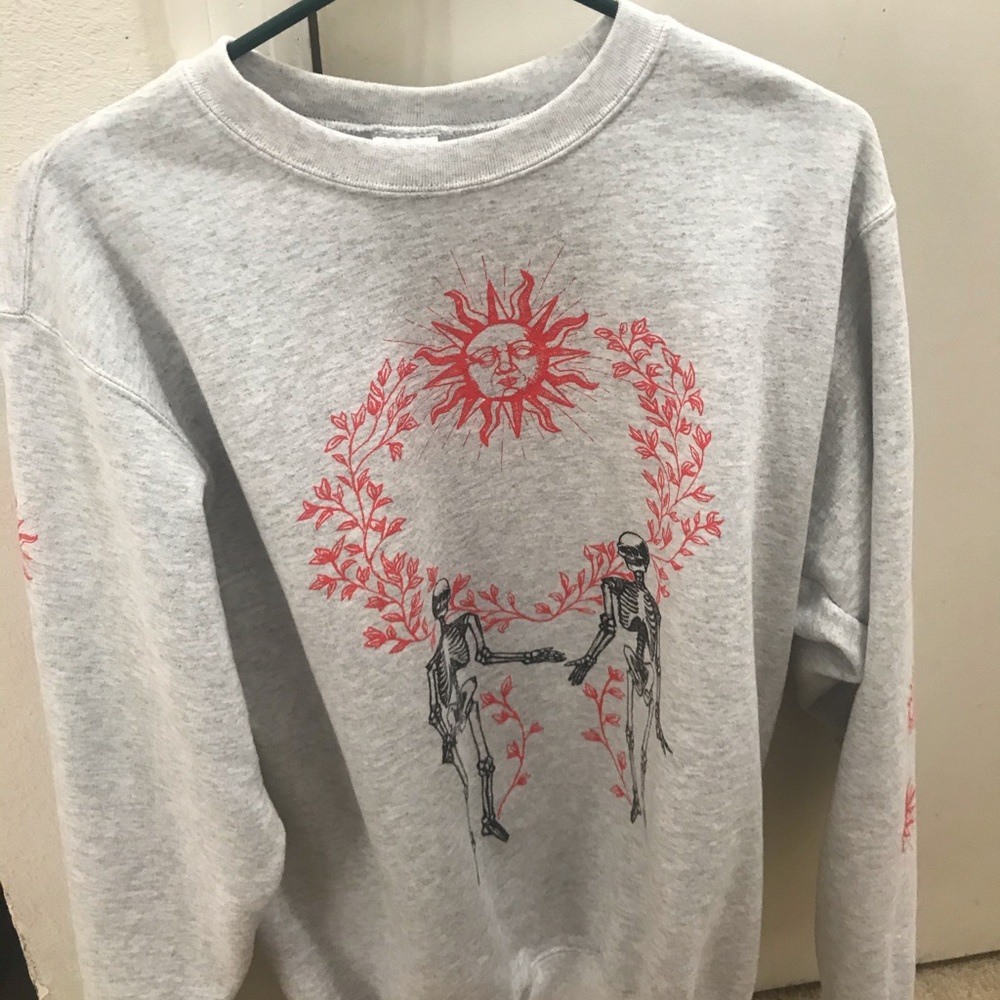 Skeleton and sun sweater